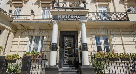 OYO Huttons Hotel